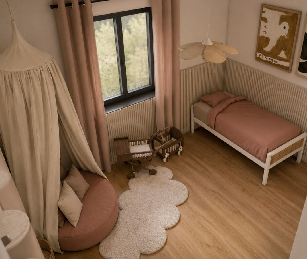 Chambre d'enfant avec ciel de lit rose poudré et tapis festonné, décoration Atelier Luzons
